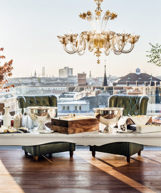 Generous breakfast buffet at the Grand Étage above the rooftops of Vienna.